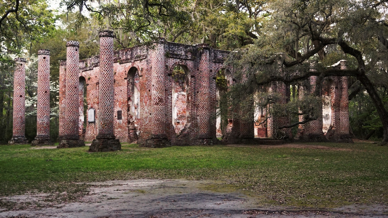 brown building near green trees